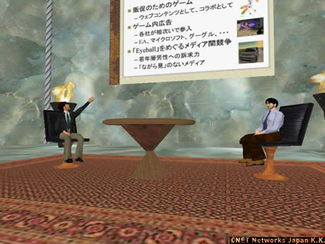 　Second Life内では山口氏のアバター（左）がスライドをめくりながら講演。