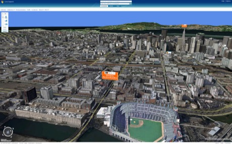　Microsoftが米国時間11月6日に発表した「Virtual Earth 3D」では、写真のようにリアルな風景の中にある建物の上空にバナーを浮かべ、企業広告を表示させることができる。同アプリケーションはブラウザにダウンロードして使うもので、Microsoftの地図および地域検索サービスにVirtual Earthの3D機能を統合する。