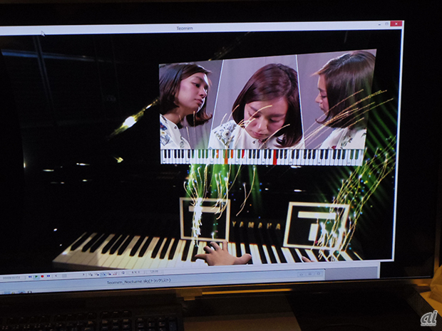 　「テオミルン」はVR映像と立体音響を使ってピアノ演奏視聴ができるという新体験型のシステム。ヤマハと共同で開発しており、ヘッドマウントディスプレイを装着し、ピアニストの演奏を自由な視点から見ることができる。加えてヘッドホンから立体音響を聴くことで、視聴時の位置や向きに連動した音表現が可能になる。

　有名ピアニストの演奏を自宅で視聴できるほか、初心者向けレッスンツールとしても最適としている。
