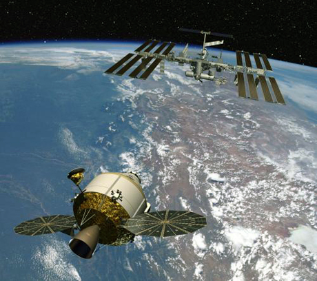 Orion CEV（Crew Exploration Vehicle）

　コンステレーション計画には、将来、宇宙飛行士と重い貨物を宇宙空間に運ぶ打ち上げロケット「Ares」と、実際に宇宙飛行士が乗って飛行する乗員輸送用小型宇宙船（CEV）「Orion」がある。Orionは、今後10年以内の初飛行が予定されており、最終的には再び人類を月へ送り、また火星などの太陽系内の目的地へと送ることを目指している。

　この想像図は、Orionが、地球軌道上の国際宇宙ステーションに接近している様子だ。