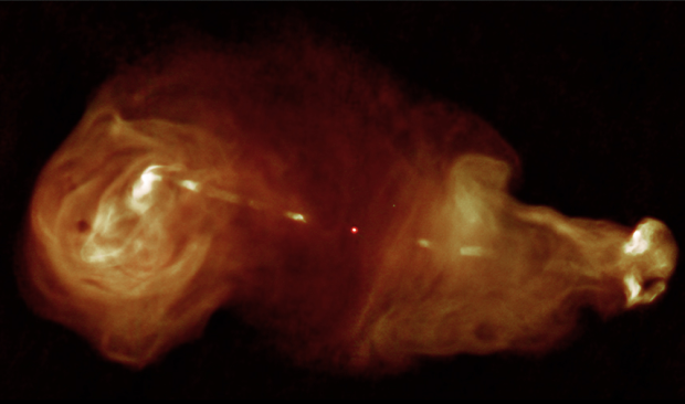 　「3C353」が生み出す放射線が巨大な渦を巻いている。3C353は、銀河の中心にある超巨大ブラックホールで、地球からの距離は約4億1000万光年。