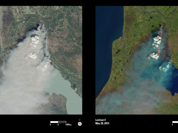 アラスカの奇妙な森林火災

　最新の技術により、Landsat 8は赤外線センサを使って山火事の煙を透かして見ることができる。例えば、このアラスカ南中央の写真がそうだ。左の画像は、写真に近い自然の色で撮影されている。右は同じ画像に赤外線処理が施されたものだ。