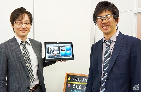 KDDI 研究所 研究マネージャーの辻智弘氏（左）と同研究員の巻渕有哉氏（右）
