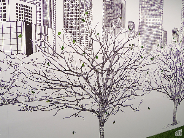 　イラストで描かれた木には、来場者がシールを貼ることで、葉が茂っていくという仕掛け。葉のシールがもらえるので、貼りつけてみよう。