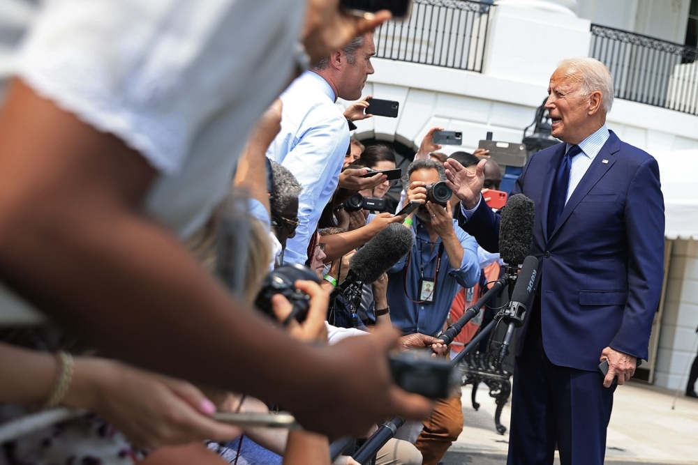 US President Joe Biden stops to take a question from NBC correspondent Peter Alexander while departing the White House on July 16.