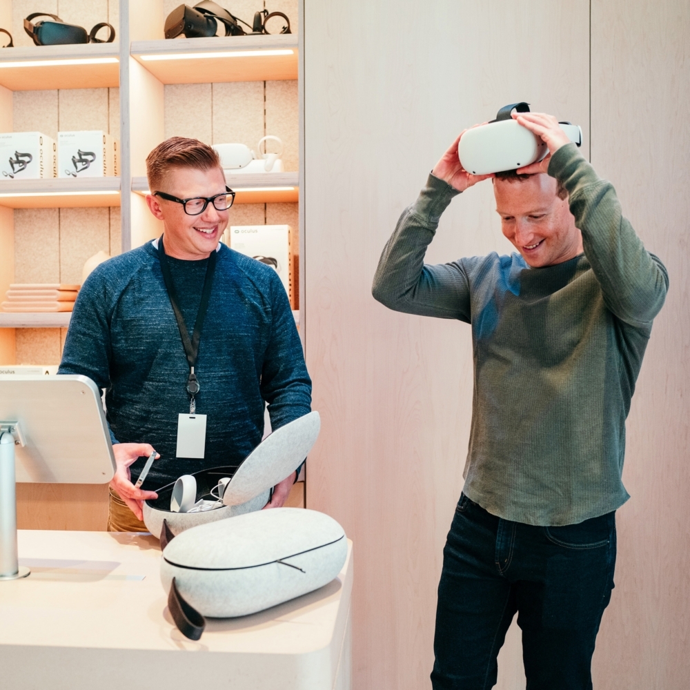 Meta CEO Mark Zuckerberg tries on a virtual reality headset in the Meta Store.