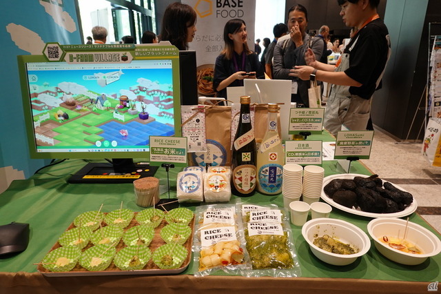 　D-Farm Villageのビジョンに共感する生産者として、静岡県の「CREA FARM」と山形県の「農園貞太郎」が出展。焼津かつおの和風ペーストや静岡産のオリーブオイル、米からできたチーズ、バイオ炭や農薬の抑制などでCO2削減をした米などを展示した。
