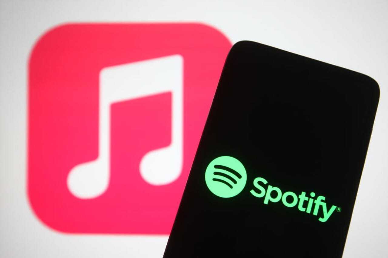 「Apple Music」と「Spotify」のロゴ