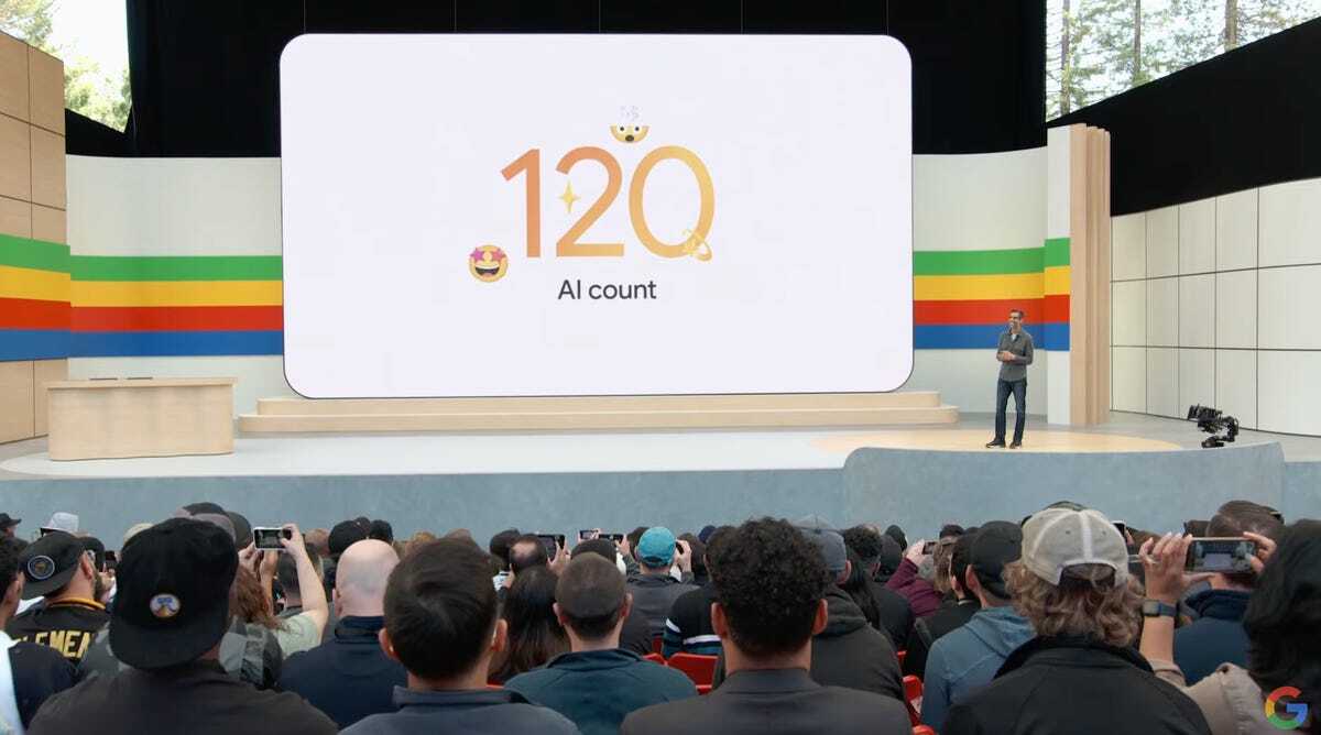 ステージ上のスライドに「120 AI count」と書かれている