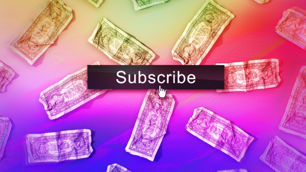 「Subscribe」の文字と米国紙幣